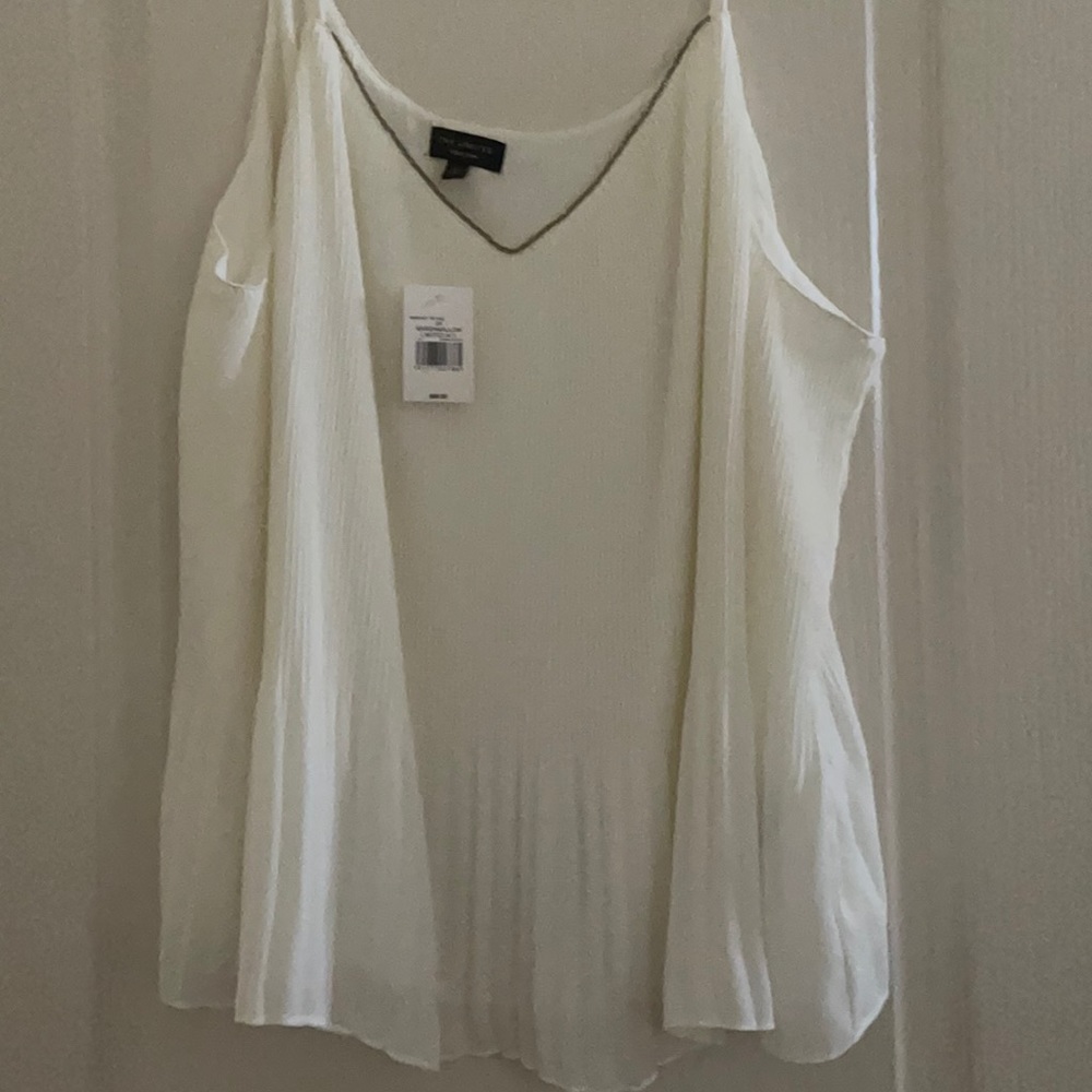 Cream colored  sleeveless top